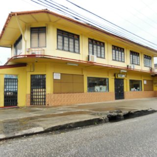 Woodbrook POS Building for Sale